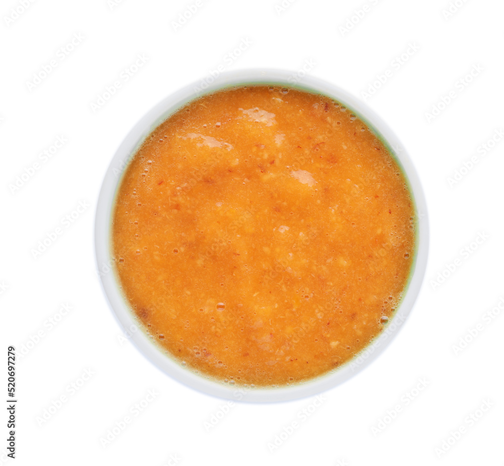 Fruit puree in bowl isolated on white, top view Fruit puree in bowl isolated on white, top view