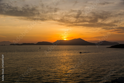 Sunset over the sea at the coast of Angra dos Reis town  State of Rio de Janeiro  Brazil. Photo taken with Nikon D7100  18-200 lens  at 29mm  1 125 f 6.3 ISO 100. Date  Dec 28  2016