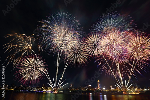 The famous beautiful Dadaocheng fireworks show at night in Taipei Taiwan photo