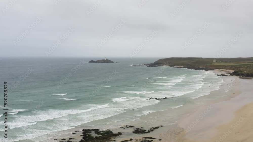 Saint Ives Bay And Beach With Godrevy Island In The Distance On Overcast Day In Cornwall, UK. - aerial Saint Ives Bay And Beach With Godrevy Island In The Distance On Overcast Day In Cornwall, UK. - aerial