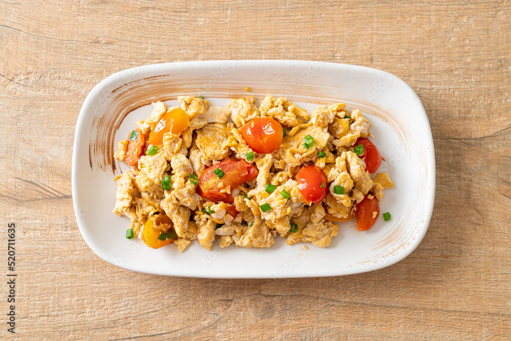 stir-fried tomatoes with egg on plate stir-fried tomatoes with egg on plate