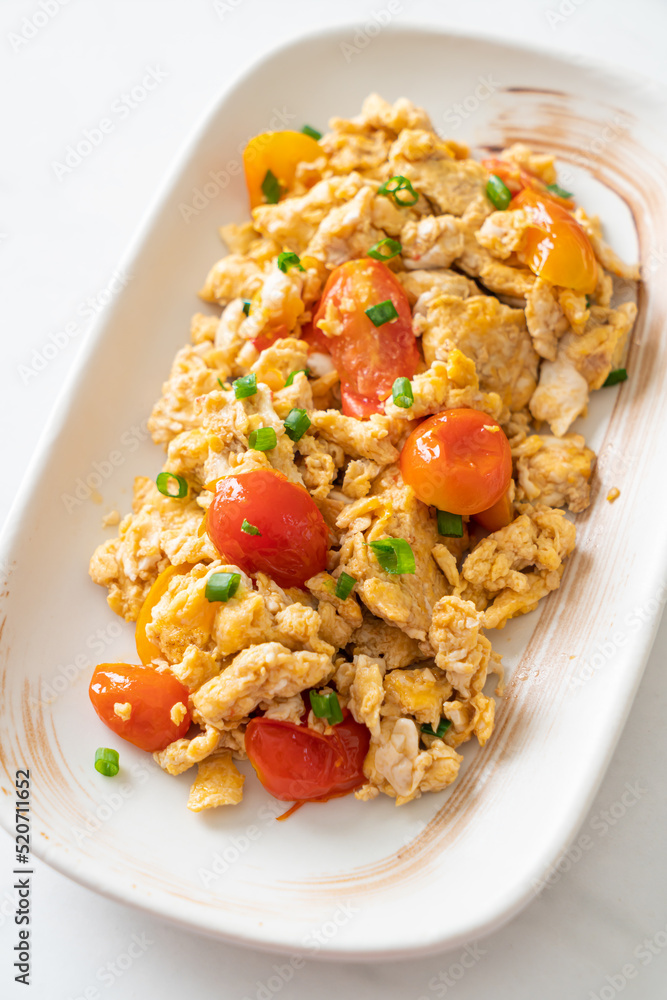 stir-fried tomatoes with egg on plate stir-fried tomatoes with egg on plate