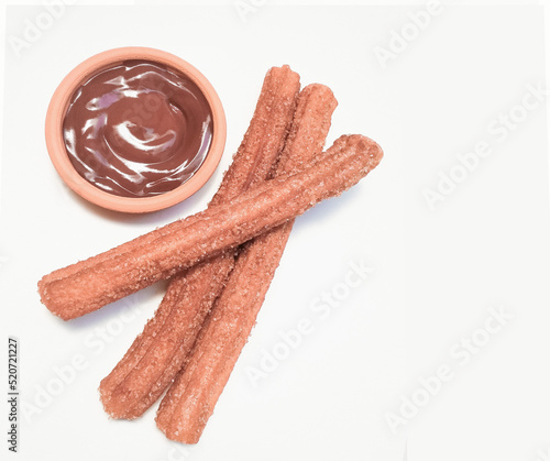 churros and chocolate top view with copy space