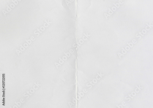 High resolution large image of white paper texture background scan folded in half, soft fine grain uncoated paper for water colors with copy space for text material mockup or presentation wallpaper