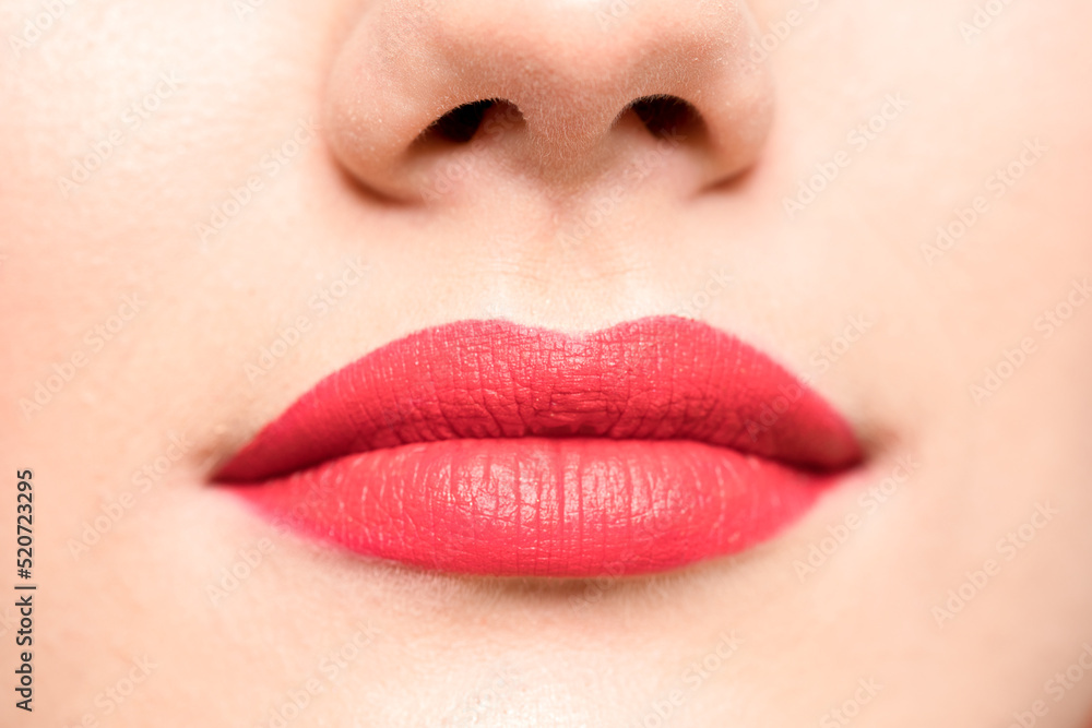 Glamorous sensual lips. Red lipstick, clear skin.