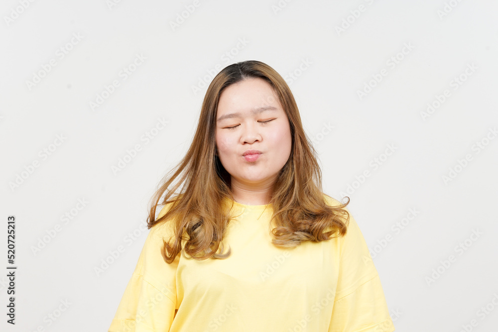 Blowing Kiss of Beautiful Asian Woman wearing yellow T-Shirt Isolated On White Background Blowing Kiss of Beautiful Asian Woman wearing yellow T-Shirt Isolated On White Background