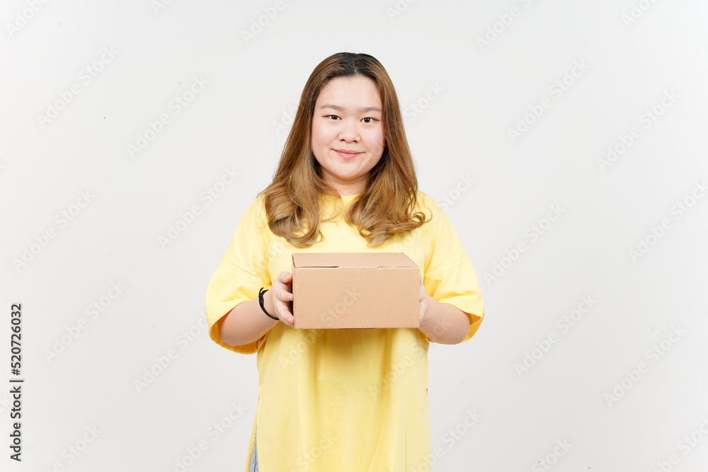 Holding Package Box or Cardboard Box of Beautiful Asian Woman wearing yellow T-Shirt Holding Package Box or Cardboard Box of Beautiful Asian Woman wearing yellow T-Shirt