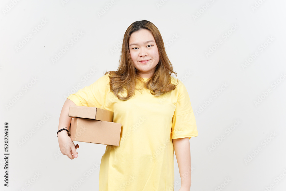 Holding Package Box or Cardboard Box of Beautiful Asian Woman wearing yellow T-Shirt Holding Package Box or Cardboard Box of Beautiful Asian Woman wearing yellow T-Shirt