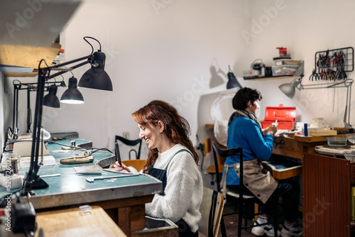 Принти на полотні Women Working in Artisan Workshop