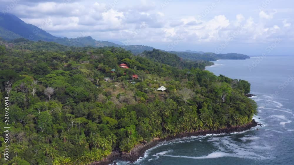 Aerial Drone View of Rainforest and Ocean on the Pacific Coast in Costa Rica, Tropical Jungle Coastal Landscape Scenery with the Sea at Ballena Marine National Park (Parque Nacional Marino Ballena) Aerial Drone View of Rainforest and Ocean on the Pacific Coast in Costa Rica, Tropical Jungle Coastal Landscape Scenery with the Sea at Ballena Marine National Park (Parque Nacional Marino Ballena)