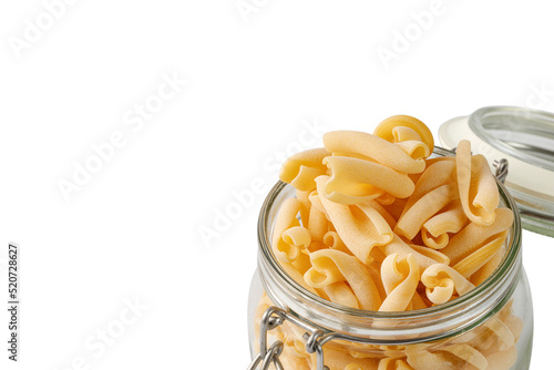Maccheroni, Maccheroncini. Italian homemade pasta in glass jar .isolated on white background. Close up.