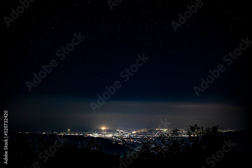 星空と夜景と街並み（長野県伊那市） © buritora