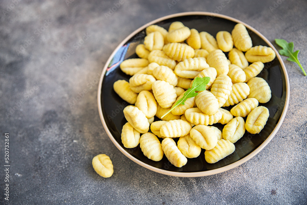 raw gnocchi dough, potatoe cuisine fresh meal food snack on the table copy space food background raw gnocchi dough, potatoe cuisine fresh meal food snack on the table copy space food background