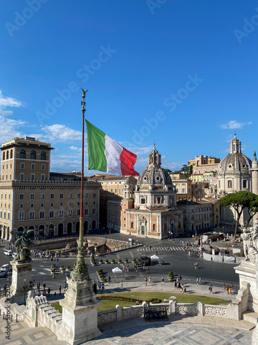 Photography The Itlay flag fluttering on the flagpole in the Vittorio Emmanuelle II National