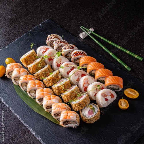 tasty sushi on the black background