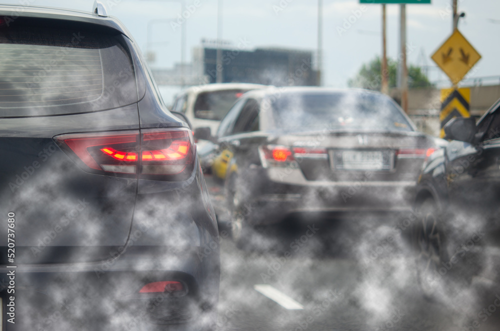 Car exhaust fumes during traffic jams on the road cause environmental emissions.
