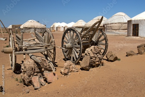 Ancient carriages and yurts at Ayaz Kala fort. Karakalpakstan. Uzbekistan. 