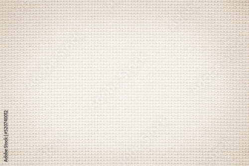Fabric canvas woven texture background in pattern in light beige cream brown color.