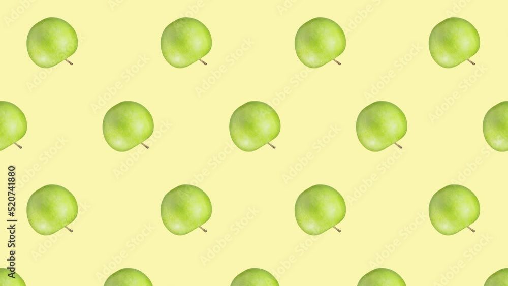 Minimal motion design - green apples rotating and moving down at Yellow color background. Trendy colors and style graphics. Seamless looping animation. Minimal motion design - green apples rotating and moving down at Yellow color background. Trendy colors and style graphics. Seamless looping animation.