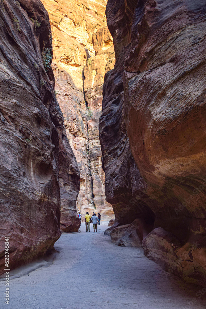 The Siq, the narrow slot-canyon that serves as the entrance passage to the hidden city of Petra, Jordan (the UNESCO heritage list).
