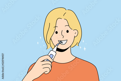 Smiling woman with braces clean teeth with dental irrigator. Happy female use brush take acre of oral hygiene. Dentistry and healthcare. Vector illustration. 