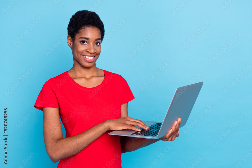 Photo of charming pretty short hair person dressed red t-shirt chatting modern gadget isolated blue color background Photo of charming pretty short hair person dressed red t-shirt chatting modern gadget isolated blue color background