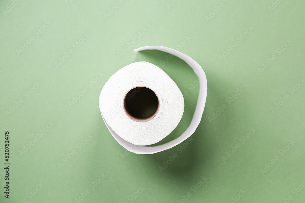 toilet paper from recycled materials. White toilet paper on green background. toilet paper in a roll, close-up. Recycled paper zero waste toilet paper from recycled materials. White toilet paper on green background. toilet paper in a roll, close-up. Recycled paper zero waste