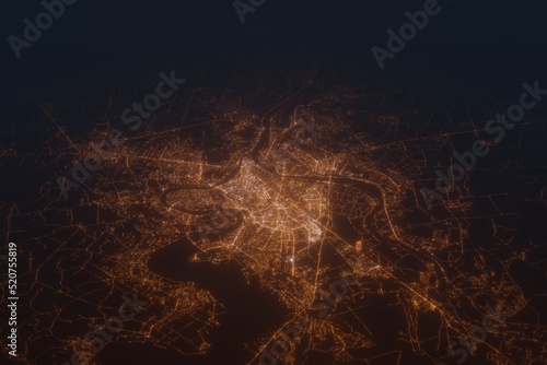 Aerial shot on Kaunas (Lithuania) at night, view from east. Imitation of satellite view on modern city with street lights and glow effect. 3d render