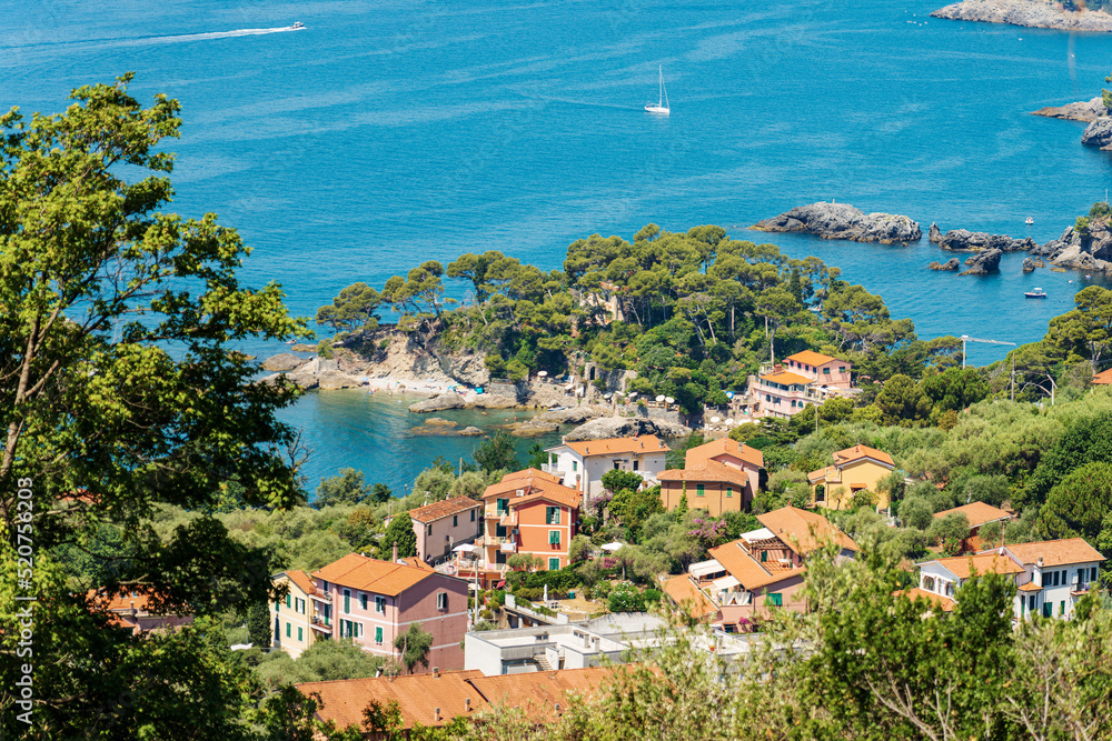 Obraz premium Aerial view of Fiascherino beach, tourist resort on the coast of the Gulf of La Spezia or Gulf of Poets, Lerici municipality, Liguria, Mediterranean sea, Italy, southern Europe.