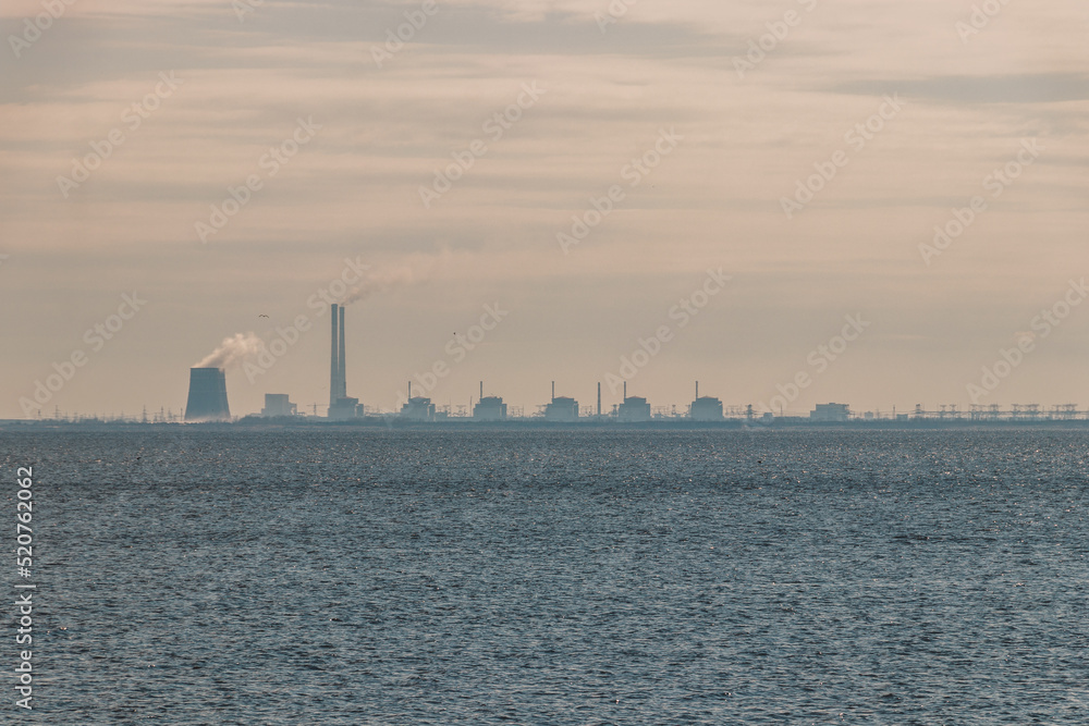 View of the Zaporozhye NPP in Energodar from above. Photo from the embankment of Nikopol. Industry. Kakhovka reservoir