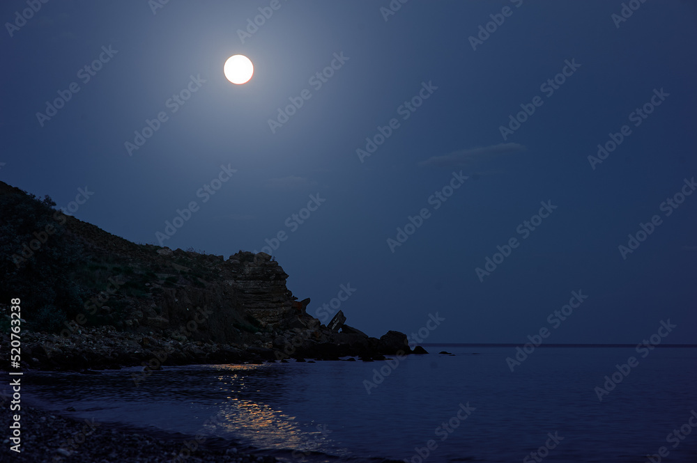 Beautiful seascape with full moon. Night on beach. Beautiful seascape with full moon. Night on beach.