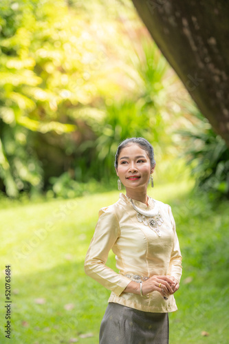 Beautiful Thai girl in Thai traditional costume