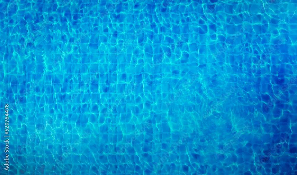top down view of rippled clear blue water in swimming pool top down view of rippled clear blue water in swimming pool