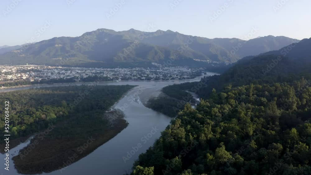 Aerial Panorama Of Ganges River And Lush Forest Valleys Near Rishikesh In The State of Uttarakhand, India. Aerial Panorama Of Ganges River And Lush Forest Valleys Near Rishikesh In The State of Uttarakhand, India.