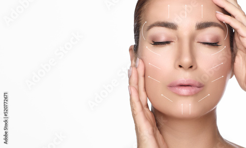 Beauty and Aged Skin Care Concept. Natural Woman Face with Healthy Flawless Skin and Lifting Arrows over face. photo