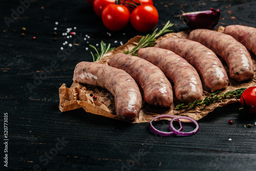 Raw stuffed sausages on srill pan, Sausages in cookware. Sausages for grilling. banner, menu, recipe place for text, top view