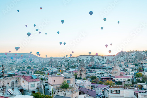 hot air balloons rising into sky, concept of must see travel destination, bucket list trip