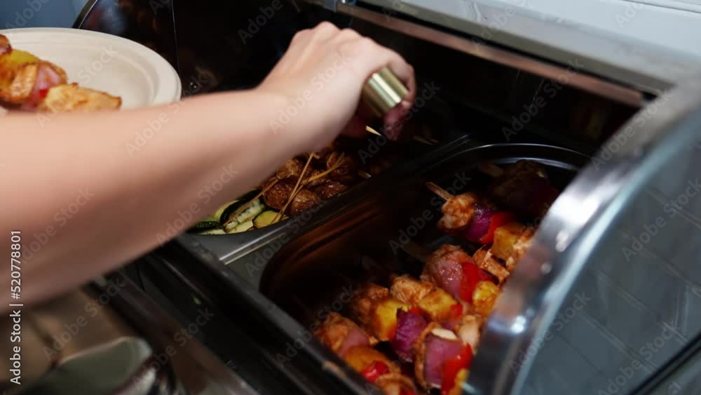 Chafing Dish with assorted grilled meat and vegetables. Chafing Dish with assorted grilled meat and vegetables.