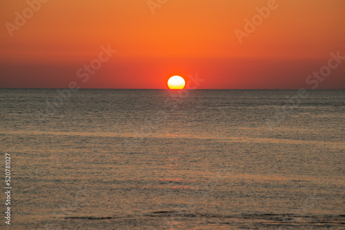 tramonto all'isola delle femmine in sicilia photo