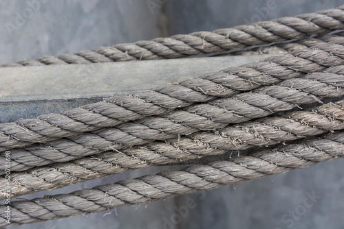Five ropes with gray background on fishing boat. Abstract. Strength. Motivation. Business 