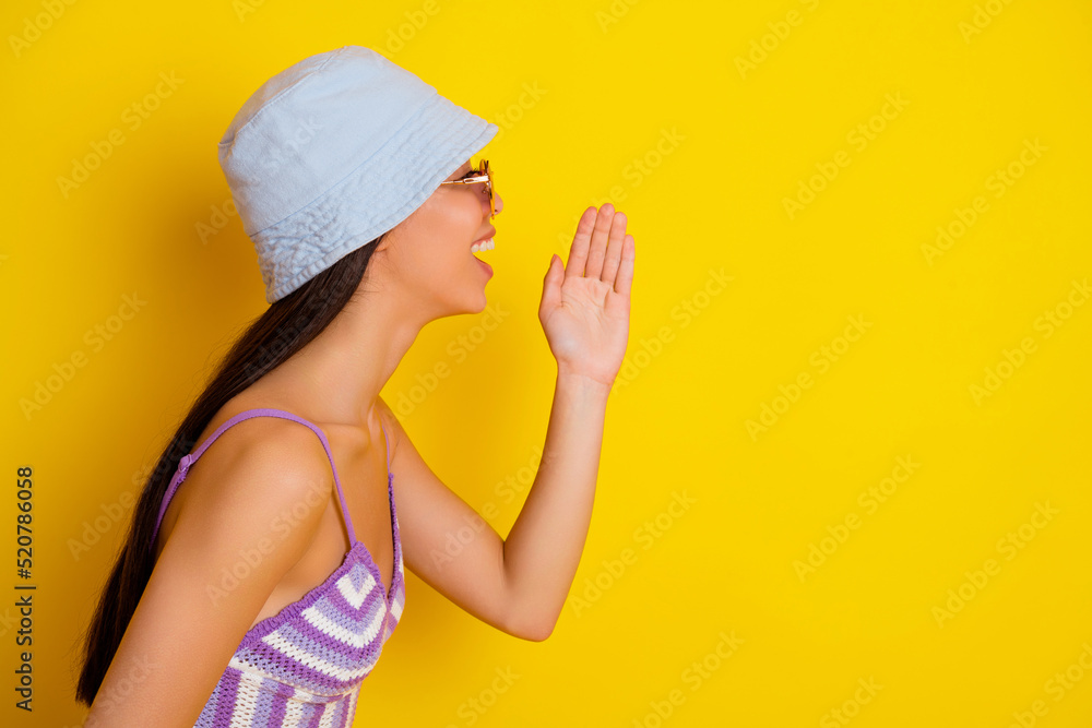 Photo of funky pretty girl dressed swimsuit bra cap screaming announcement empty space isolated yellow color background Photo of funky pretty girl dressed swimsuit bra cap screaming announcement empty space isolated yellow color background
