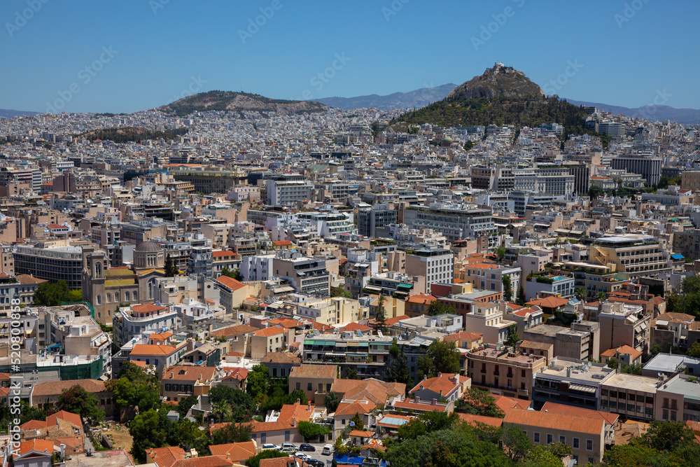 General view of Athens. View of the city and Mount Lycabette on a sunny day from the Acropolis. Greece, July 2022.
