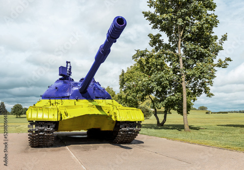 Tank. Military, war defense concept. Ground combat with Ukraine flag of blue and yellow colors.