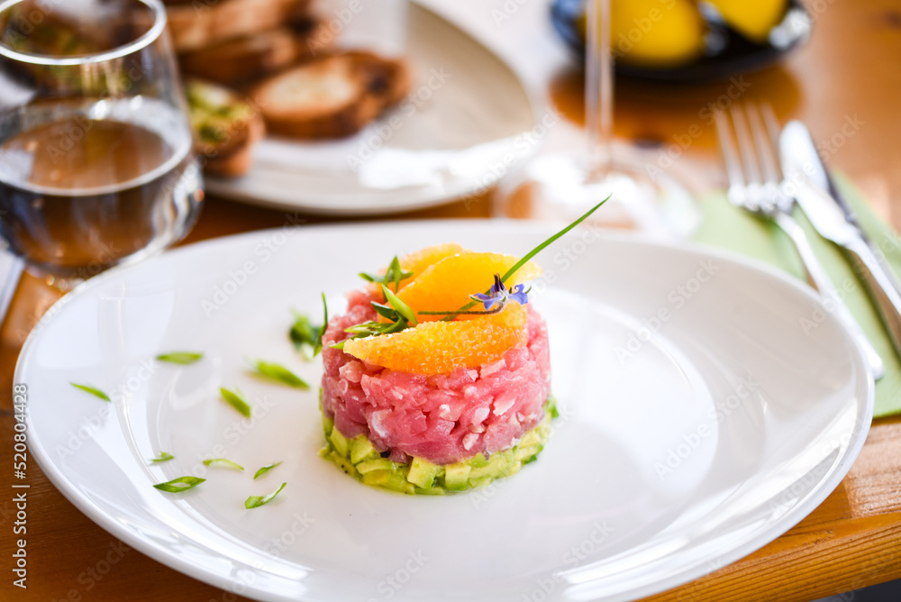 delicious tuna tartar with fresh avocado and orange