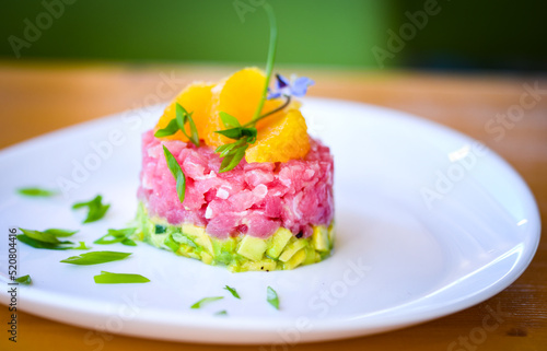delicious tuna tartar with fresh avocado and orange