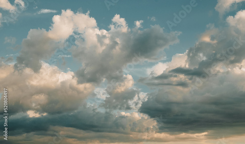 Clouds at sunset  summer sky background  evening cloudscape