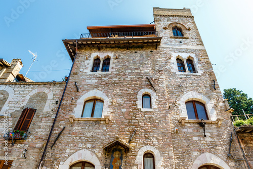 Facade of an old building in the historic center of Assisi, Umbria, Italy, Europe © jeeweevh