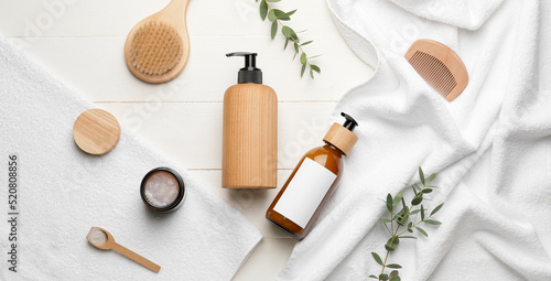 Bottles of shampoo, comb, t...