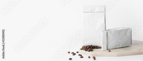 Coffee bags on white background with space for text