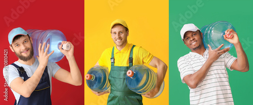 Set of delivery men with bottles of water on color background